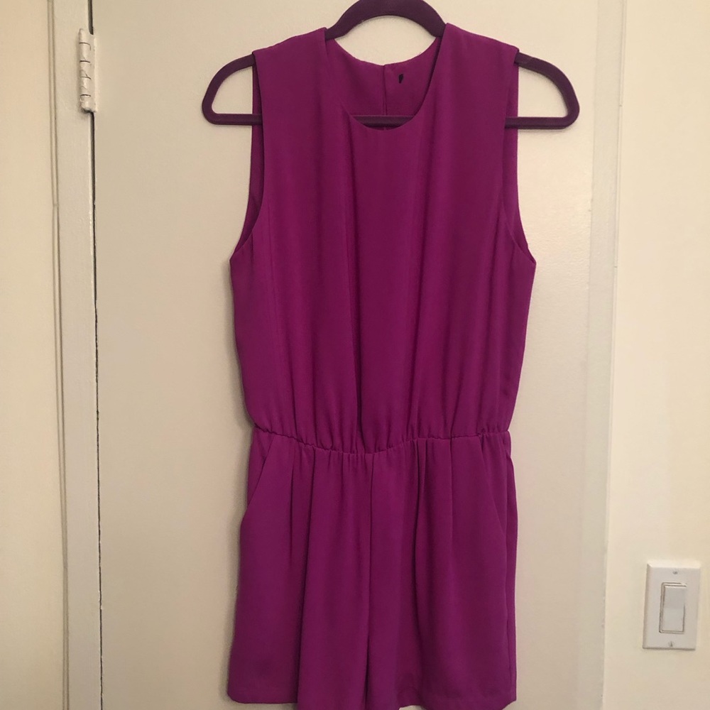 Raspberry color sleeveless romper with pockets